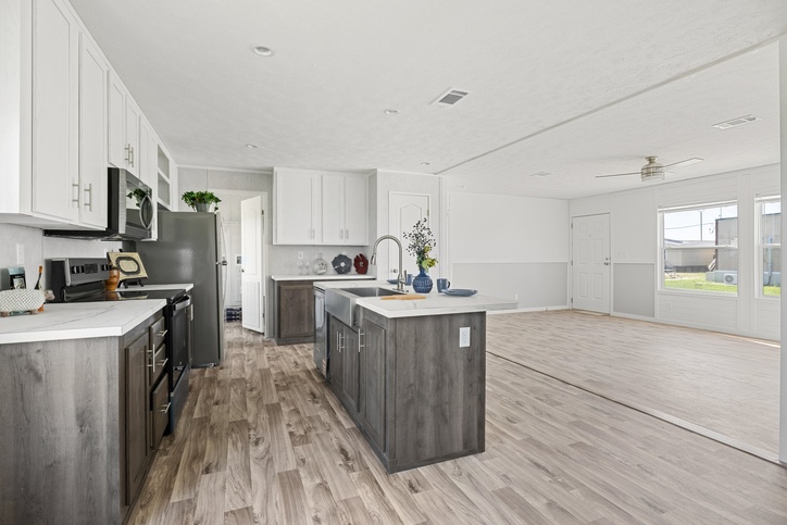 Open-concept kitchen and living area inside the new double-wide