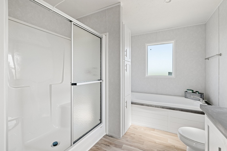 Primary bathroom with walk-in shower and soaking tub