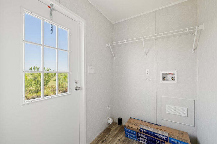 Laundry room with washer and dryer hookups and exterior door