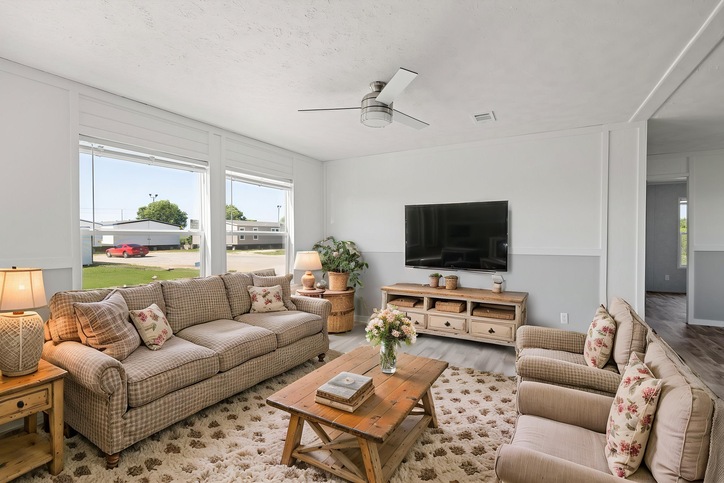 Furnished open living room inside the new double-wide