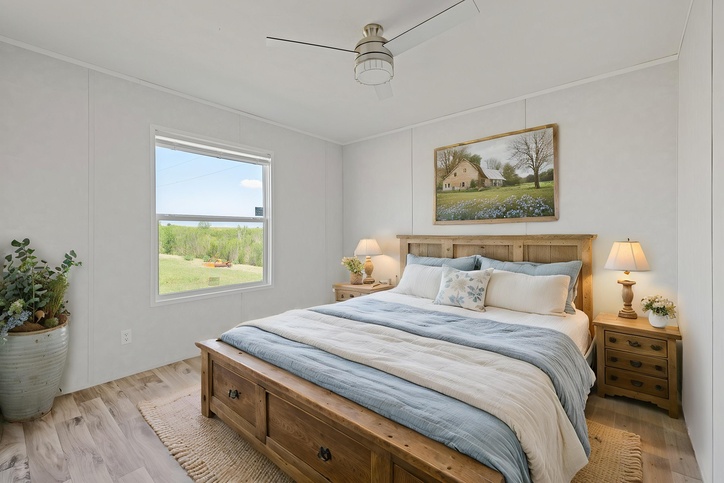 Staged primary bedroom inside the new double-wide